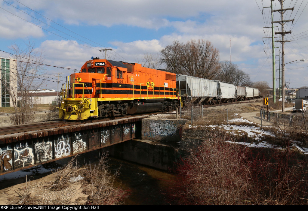 2104 sits over Indian Mill Creek as it waits for a signal across the diamond